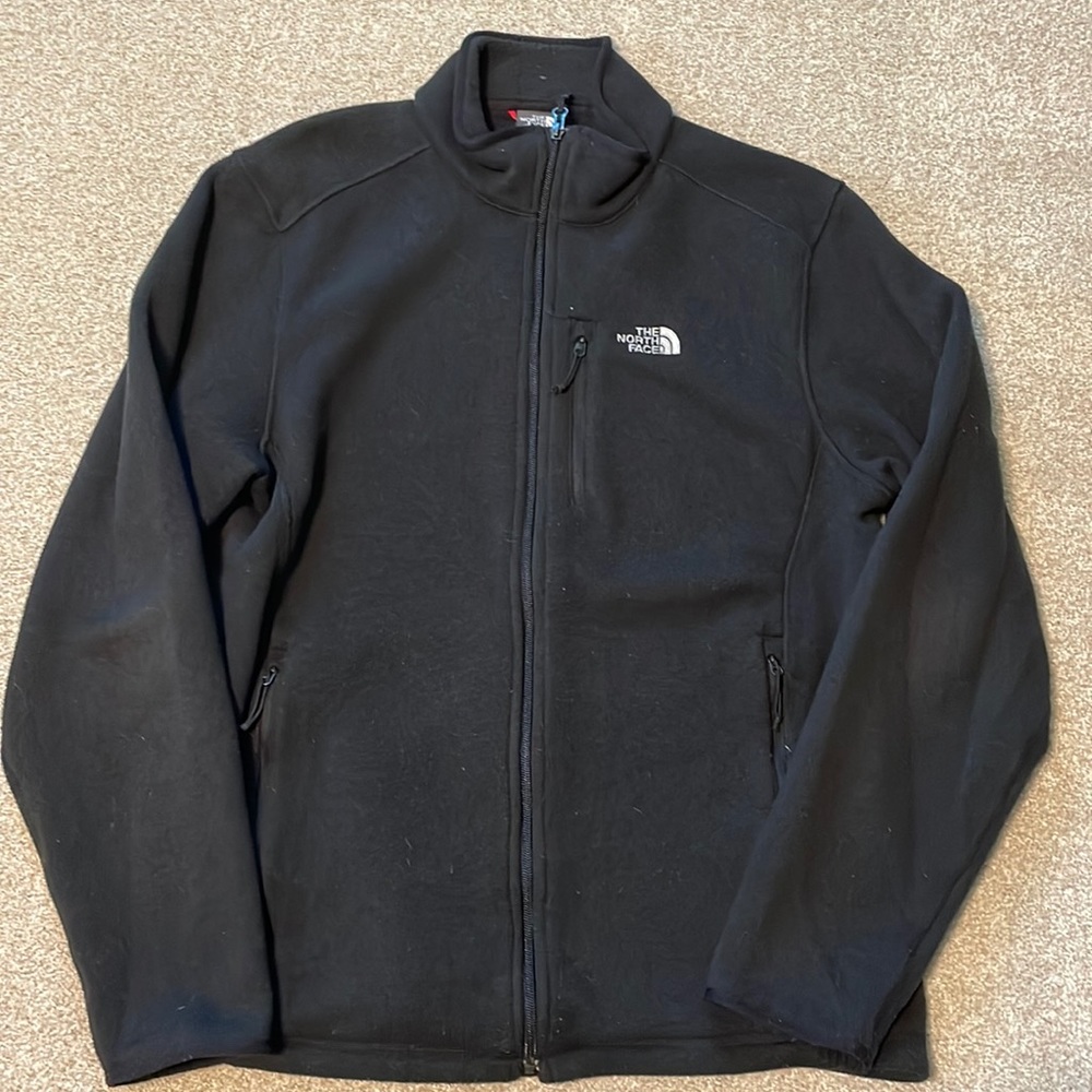 The North Face Men’s Large Zip Up Fleece Jacket in Black.
